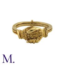 A Gold Fede Gimmel Ring, in 18k yellow gold, comprising three articulated bands, designed as two