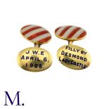 A Pair of Enamel Cufflinks in 9K yellow gold with enamel red and white stripes to one face and