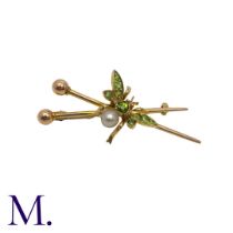 A Demantoid and Pearl Insect Brooch in yellow gold, comprising two crossed pins, adorned by a