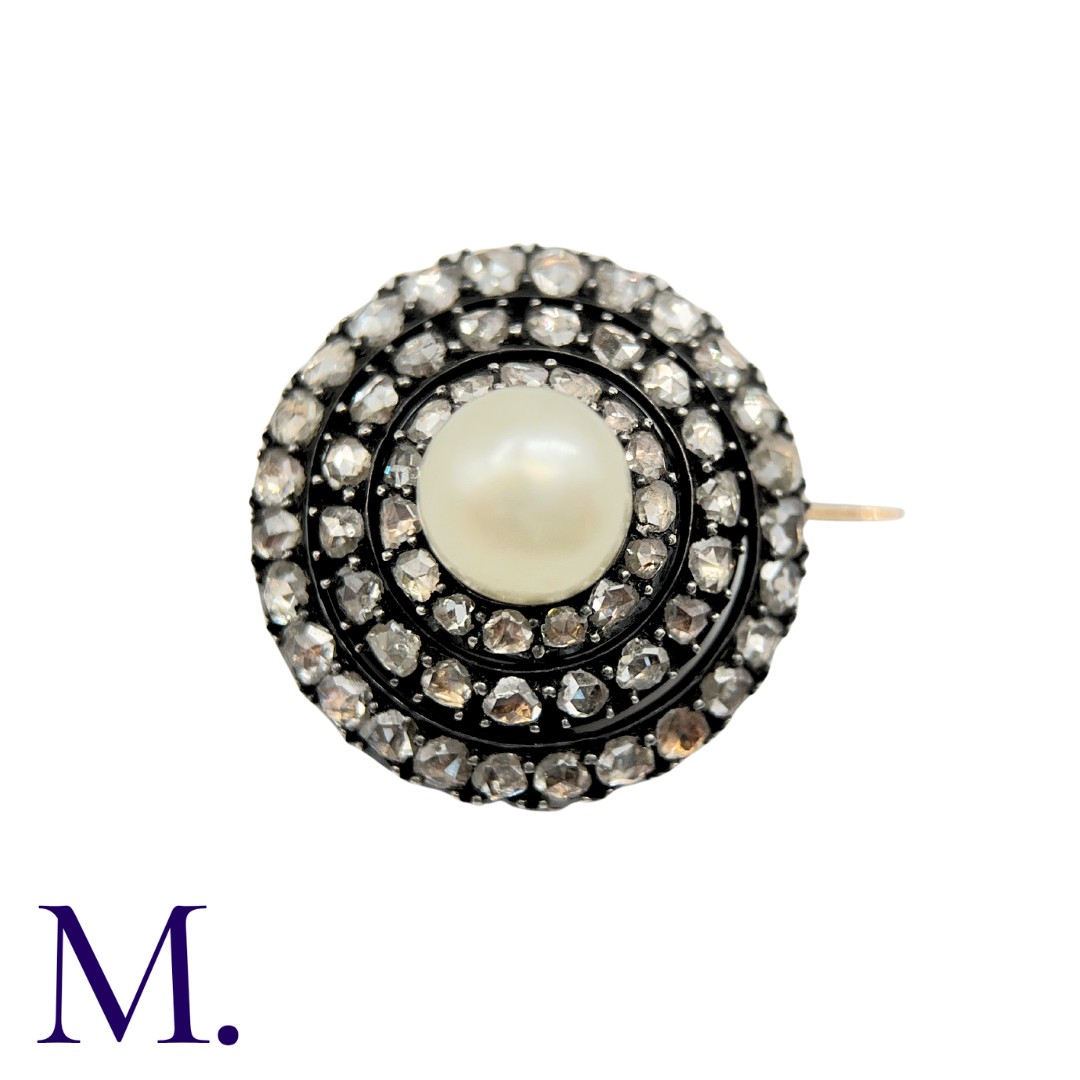 An Antique Natural Pearl and Diamond Brooch in gold and silver. Set with a pearl (accompanied by a