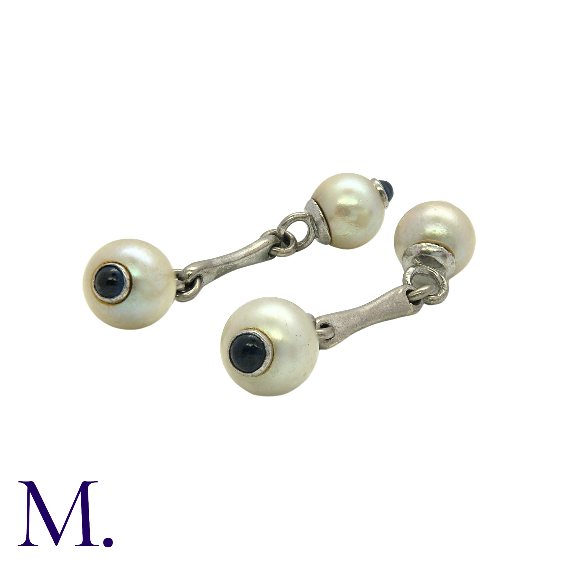 A Pair of Pearl and Sapphire Cufflinks in white gold set with pearls of approximately 7.5mm diameter