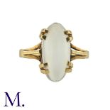 A Moonstone Ring in 18K yellow gold, set with a cabochon moonstone. French marks for 18ct gold.