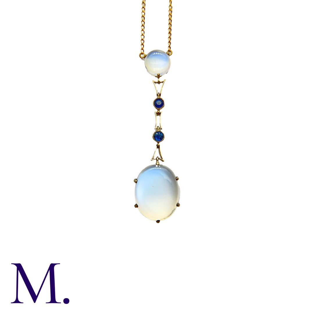 A Moonstone and Sapphire Pendant with Chain in yellow gold, set with an oval cabochon moonstone drop