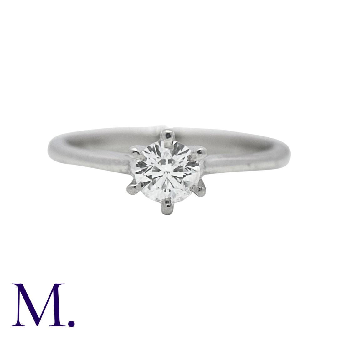 A Diamond Solitaire Ring in platinum, set with a round cut diamond of approximately 0.35cts. Stamped