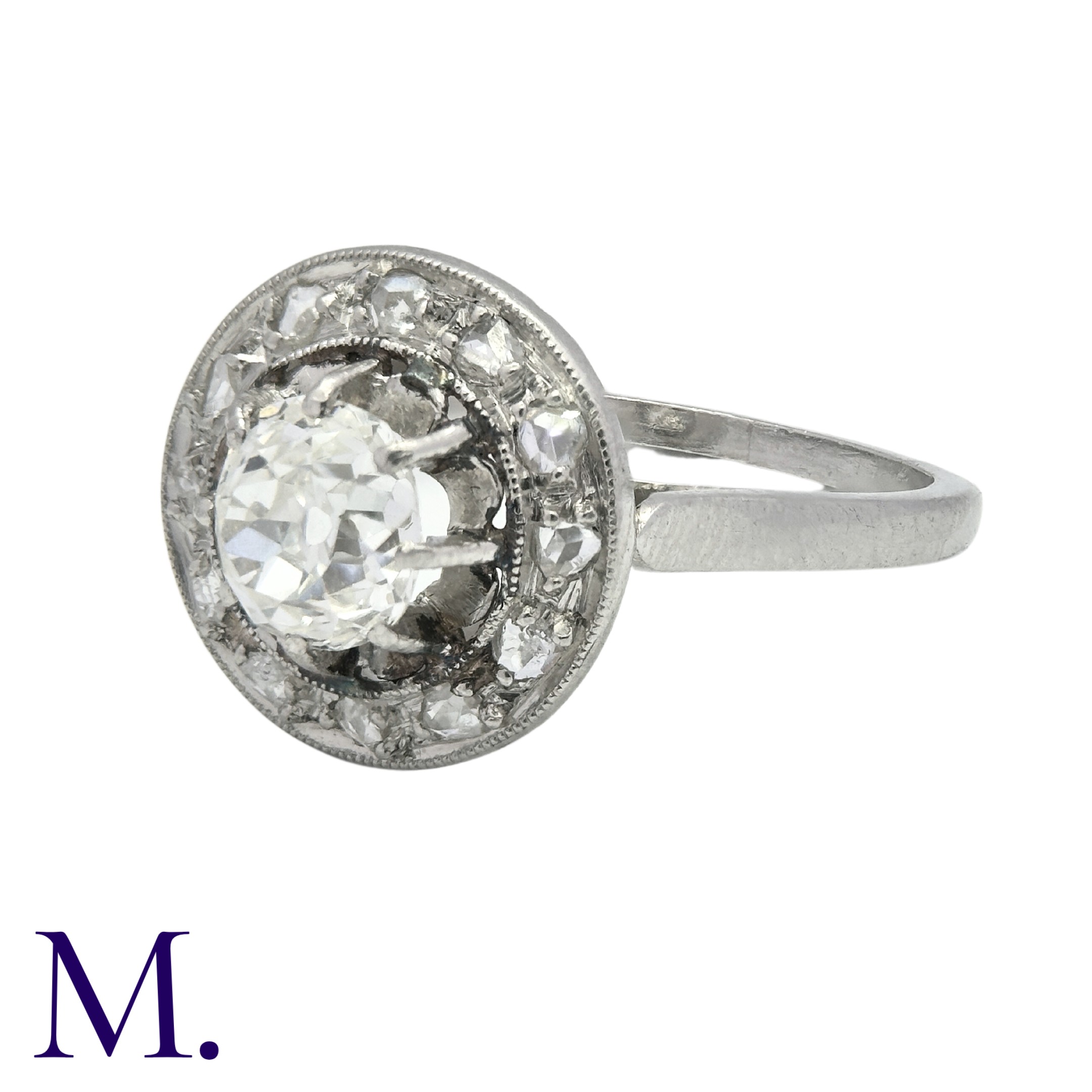 A Diamond Cluster Ring in platinum, set with an old cut diamond of approximately 1.0ct to the centre