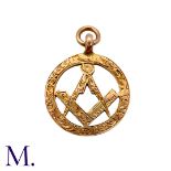 A Masonic Pendant in 9K rose gold, with compass and set square motif, with engraved decoration.