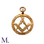 A Masonic Pendant in 9K rose gold, with compass and set square motif, with engraved decoration.