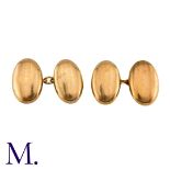 A Pair of Oval Cufflinks in 9K yellow gold with a lightly etched pattern. Size: 1.8cm Weight: 5.2g