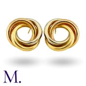A Pair of Tri-Colour Earrings in 18K yellow, rose and white gold, in the form of intertwined