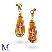 Antique Cameo Earrings in 18k yellow gold, the drop shaped carved cameos each depicting a cherub