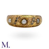 An Antique Pearl And Diamond Ring in 18k yellow gold, set with three pearls within star motifs and