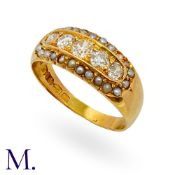 A Pearl And Diamond Ring in 18k yellow gold, set centrally with a row of old cut diamonds