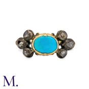 An Turquoise And Diamond Ring in yellow gold and silver, principally set with a cabochon cut