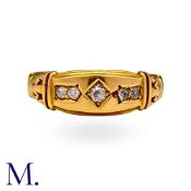 An Antique Diamond Gypsy Ring in yellow gold, set with five old cut diamonds to a stylised band.