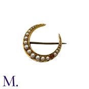 A Pearl Crescent Brooch in yellow gold, of crescent form set with a row of graduated pearls.