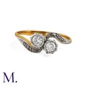 A Diamond Toi Et Moi Ring in yellow gold, set with two round cut diamonds totalling approximately