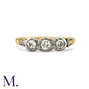 A Diamond Three Stone Ring in 18k yellow gold and platinum, set with three old cut diamonds