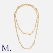 GEORGES LENFANT. A Two-Colour Gold Chain in 18ct yellow and white gold, made up of fancy bar and