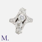 A Diamond 4-Stone Ring in 18K white gold, set with four round-cut diamonds in an off-linear pattern,