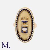 An Antique Enamel Mourning Ring in yellow gold, the oval shaped face with a blue and white enamelled