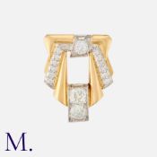 An Art Deco Diamond Clip Brooch in yellow gold and platinum, of geometric form, set with old cut