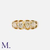 A Victorian Old Cut Diamond Ring in yellow gold, set with four old cut diamonds totalling
