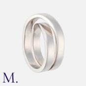CARTIER, A Nouvelle Vague Ring in 18k white gold, of looping crossover design. Signed Cartier,