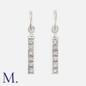 THEO FENNEL A Pair Of Diamond 'STRIP' Earrings in 18k white gold, each comprising a row of six