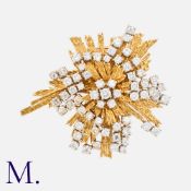 CARTIER. An Important Diamond Brooch in 18K yellow gold in an abstract starburst form, set with 53