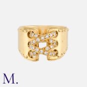 HERMES. A Diamond Corset Ring in 18K yellow gold, set with 28 diamonds to a laced corset design (TCW
