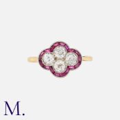 An Art Deco Ruby And Diamond Ring in yellow gold and platinum, set with a central quatrefoil motif