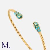 An Antique Turquoise Bangle in yellow gold, of twisted ropework design, each terminal set with