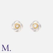 A Pair Of Diamond Stud Earrings in 18k yellow and white gold, each comprising a quatrefoil motif set