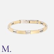 ROBERTO BRAVO. A 2-Colour Gold Bangle made up of alternating 14K white and yellow gold hinged