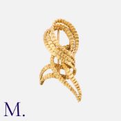 BOUCHERON, An Abstract Gold Brooch in 18k yellow gold, of abstract knotted ribbon form. Signed