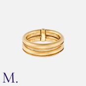 DIOR. A Gold Ring in 18k yellow gold formed of two bands with a link. Signed Ch. Dior. and French