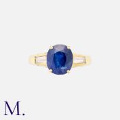 A 2.99ct Burma No Heat Sapphire And Diamond Ring in 18k yellow gold, set with a principal cushion
