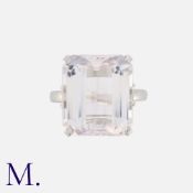A Kunzite and Diamond Ring in 18K white gold, set with a large emerald-cut kunzite (16x14mm) with