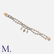 A Rose Cut Diamond Bracelet in yellow gold and silver, comprising two rows of cut-down collet set