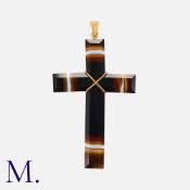 A Banded Agate Crucifix, designed as a cross cut from a single large piece of banded agate.