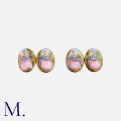A Pair Of Antique Enamel Cufflinks in yellow gold, each face with enamel decoration depicting a