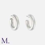 A Pair of Hoop Earrings in platinum, with 5mm wide hoop design and defender fastenings also in