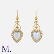 A Pair of Antique Moonstone and Diamond Heart Earrings in high carat gold, each set with heart-