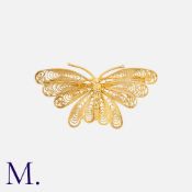 A Gold Filigree Butterfly Brooch in yellow gold, the fine openwork filigree taking the form of a