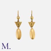 A Pair of Antique Gold Earrings in 15K yellow gold with elongated drops set to a triangular tops.