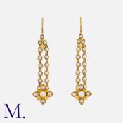 A Pair of Antique Pearl Drop Earrings in high carat gold, set with pearls to two strands
