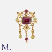 A Pink Tourmaline, Pearl And Chrysolite Brooch, in 9k yellow gold, set with a large cushion cut