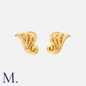 ZOLOTAS, A Pair Of Earclips in 18k yellow gold, each designed as scrolling motif. Signed ZOLOTAS,
