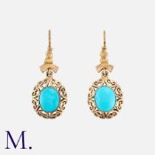 A Pair of Antique Turquoise Earrings in yellow gold, with large oval turquoise cabochons to an