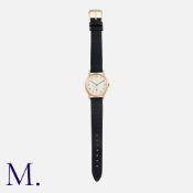 TUDOR By Rolex, A Vintage Gents Wristwatch in 9k yellow gold, with Arabic numeral hour markers and a